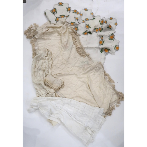 238 - a cream piano shawl, a pink shawl, a feather fringe bag, baby's blanket and other textiles