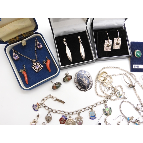 968 - A collection of silver and costume jewellery to include silver Mackintosh style jewellery, a silver ... 