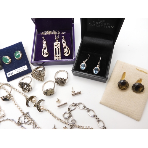 968 - A collection of silver and costume jewellery to include silver Mackintosh style jewellery, a silver ... 