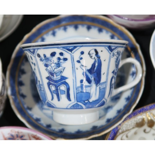 266 - A collection of Chinese and English porcelain including a blue and white tea cup decorated with vign... 