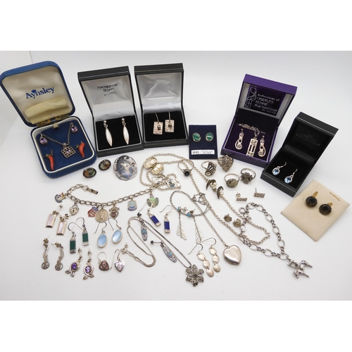 968 - A collection of silver and costume jewellery to include silver Mackintosh style jewellery, a silver ... 