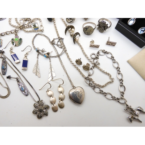 968 - A collection of silver and costume jewellery to include silver Mackintosh style jewellery, a silver ... 