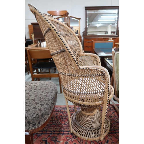 100 - A 20th century wicker conservatory peacock chair, 113cm high