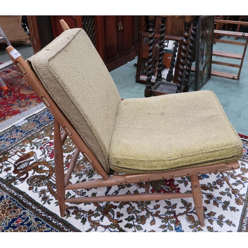 101 - A mid 20th century elm and beech Ercol 427 lounge chair with green upholstered cushions, 75cm high x... 