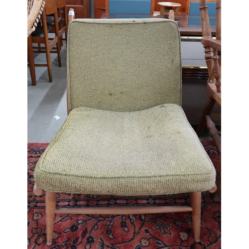 101 - A mid 20th century elm and beech Ercol 427 lounge chair with green upholstered cushions, 75cm high x... 