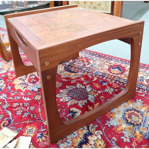 104 - A mid 20th century Scandinavian teak and glass topped circular coffee table, 43cm high x 81cm diamet... 