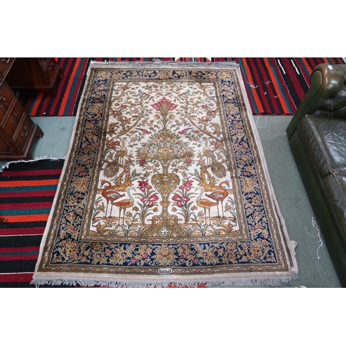 112 - A pair 20th century wool tree of life pattern rugs with floral foliate border, 228cm long x 171cm wi... 