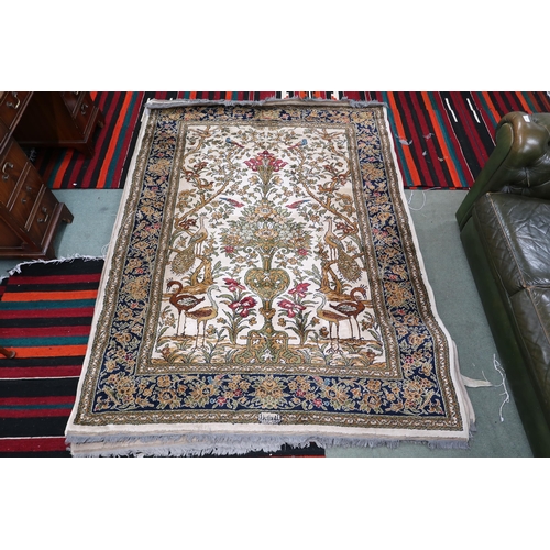 113 - A pair 20th century wool tree of life pattern rugs with floral foliate border, 228cm long x 171cm wi... 