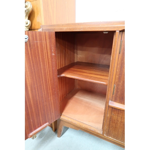 122 - A mid 20th century teak G Plan sideboard with pair of cabinet doors over single drawer to the left o... 