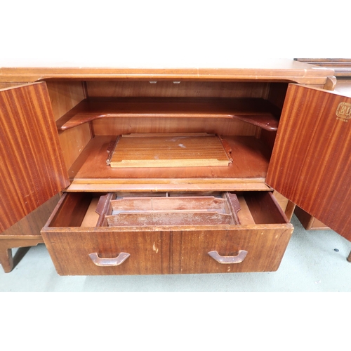 122 - A mid 20th century teak G Plan sideboard with pair of cabinet doors over single drawer to the left o... 