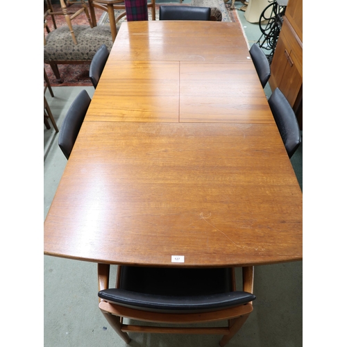 127 - A mid 20th century teak Beithcraft dining suite comprising, extending dining table, 75cm high x 137c... 