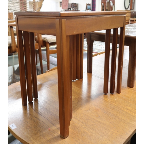 128 - A mid 20th century teak McIntosh nest of three tables on square chamfered supports, 53cm high x 54cm... 