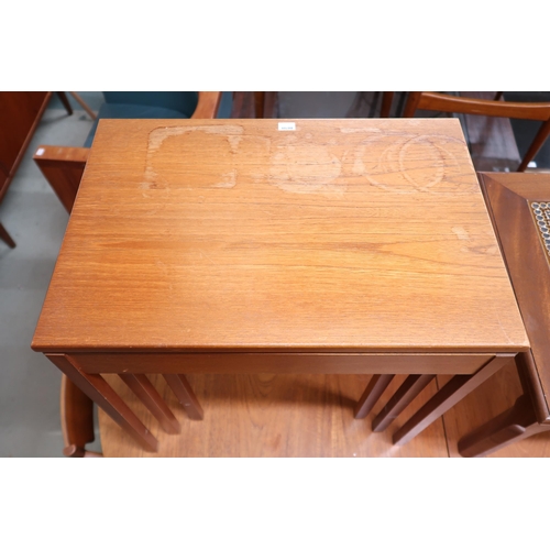 128 - A mid 20th century teak McIntosh nest of three tables on square chamfered supports, 53cm high x 54cm... 