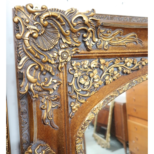 133 - A lot of two 20th century gilt framed Rococo style wall mirrors, first 120cm high x 89cm wide and se... 