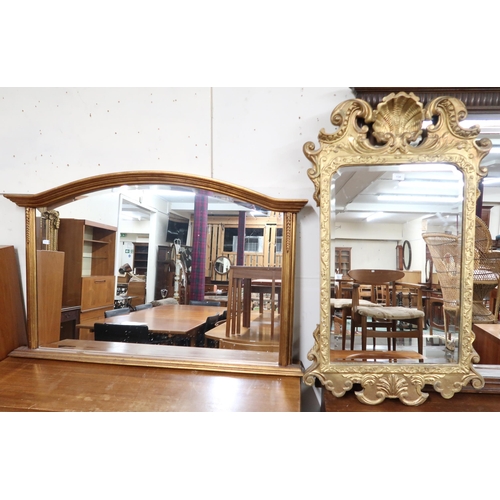 134 - A 20th century gilt framed Rococo style wall mirror, 112cm high x 67cm wide and a gilt framed overma... 