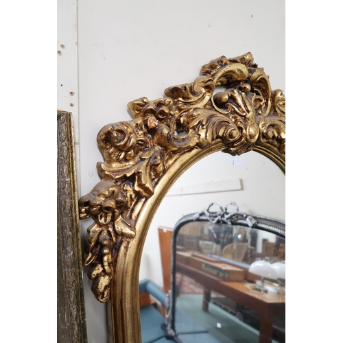 135 - A 20th century gilt framed Rococo style wall mirror, 180cm high x 69cm wide, Early 20th century rect... 