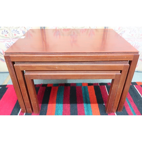 138 - A 20th century Gordan Russell nest of three tables, 46cm high x 68cm wide x 46cm deep