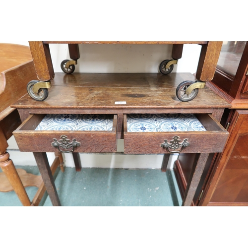 147 - A Victorian oak two drawer occasional table, pine washstand and a two tier drop side trolley (3)