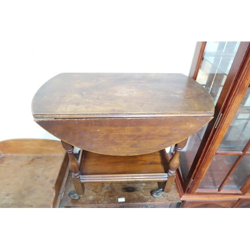 147 - A Victorian oak two drawer occasional table, pine washstand and a two tier drop side trolley (3)