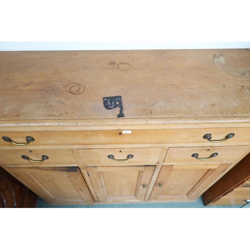 167 - A Victorian pine chest with one long over three short drawers over three cabinet doors, 137cm high x... 