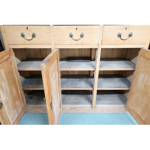 167 - A Victorian pine chest with one long over three short drawers over three cabinet doors, 137cm high x... 