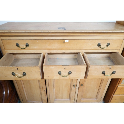 167 - A Victorian pine chest with one long over three short drawers over three cabinet doors, 137cm high x... 