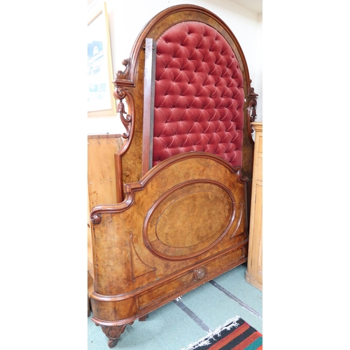 169 - A Victorian walnut bed, head board with red velour buttonback upholstery, 219cm high x 142cm wide x ... 