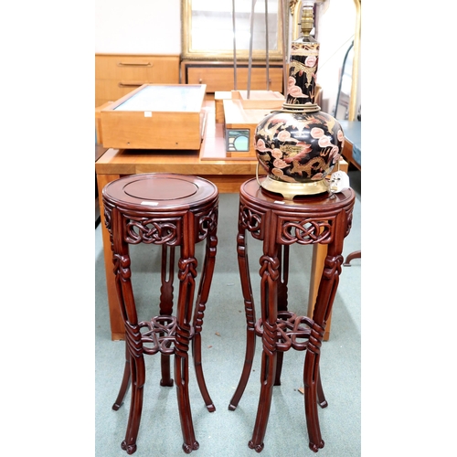 171 - A pair of 20th century Oriental hardwood two tier plant stand, 77cm high and a ceramic Oriental styl... 