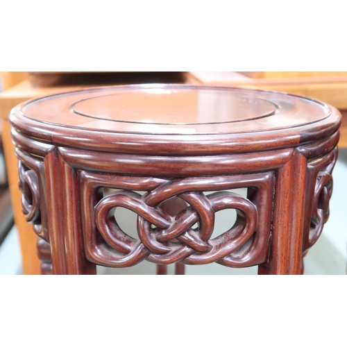 171 - A pair of 20th century Oriental hardwood two tier plant stand, 77cm high and a ceramic Oriental styl... 