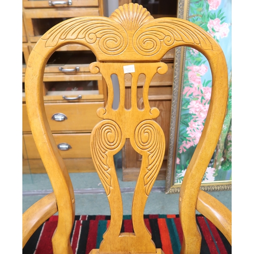 172 - A lot of three 20th century dining chairs with carved splats on turned tapering supports, 107cm high... 