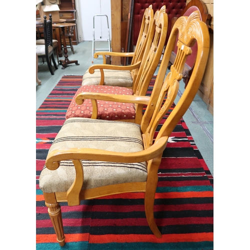 172 - A lot of three 20th century dining chairs with carved splats on turned tapering supports, 107cm high... 