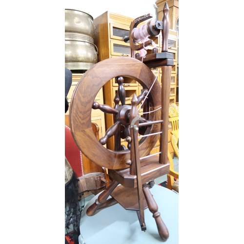 173 - A 20th century treadle spinning wheel, mid 20th century dress makers mannequin and a painted two tie... 