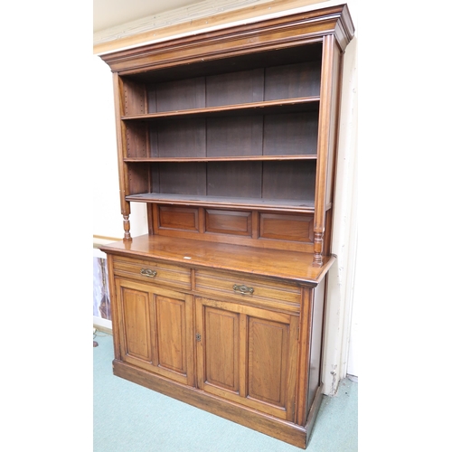 185 - An early 20th century mahogany kitchen dresser with three open shelves over two drawers over pair of... 