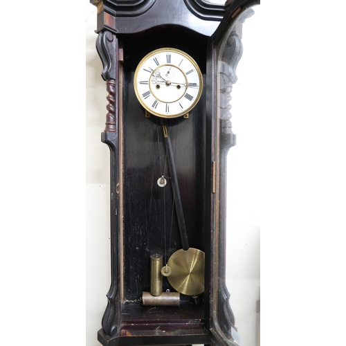 187 - A 20th century mahogany cased Vienna style wall clock, A faux black slate mantle clock and another m... 