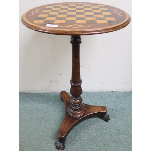 198 - A Victorian walnut circular topped games table trefoil base terminating in paw feet, 74cm high x 46c... 