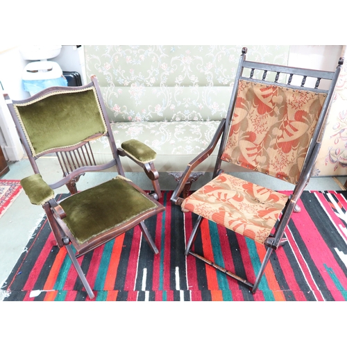 205 - A lot of two Victorian mahogany framed folding lounge armchairs (2)