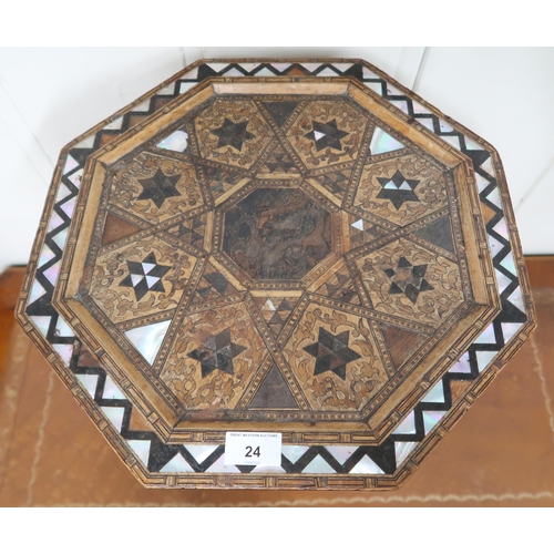 24 - An Anglo-Moorish occasional table in the manner of Liberty & Co with mother of pearl and sample ... 