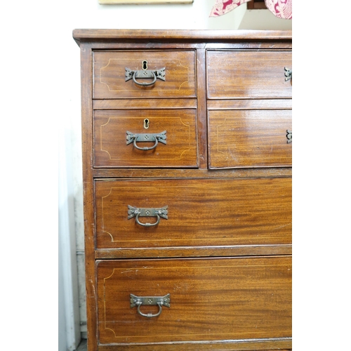 36 - A Victorian mahogany secretaire chest of drawers with fall front writing drawer flanked by two short... 