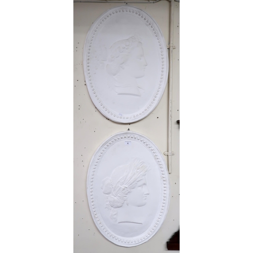 4 - A set of four oval plaster wall plaques each with cameo style silhouettes in the guise of the four s... 