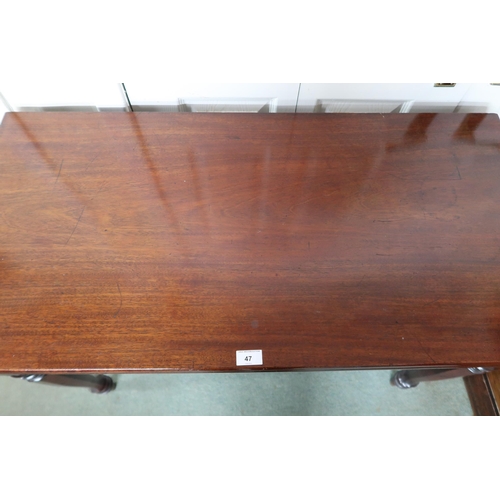 47 - A Victorian mahogany fold over tea table shaped octagonal supports, 76cm high x 107cm wide x 52cm de... 