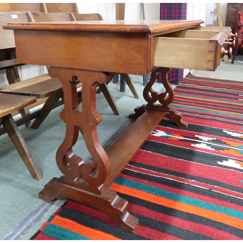 52 - A Victorian mahogany two drawer hall table on lyre shaped supports joined by low tier shelf, 74cm hi... 