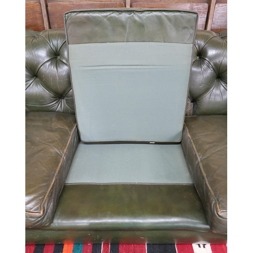 58 - A 20th century Chesterfield style green leather upholstered button back three seater club settee, 72... 