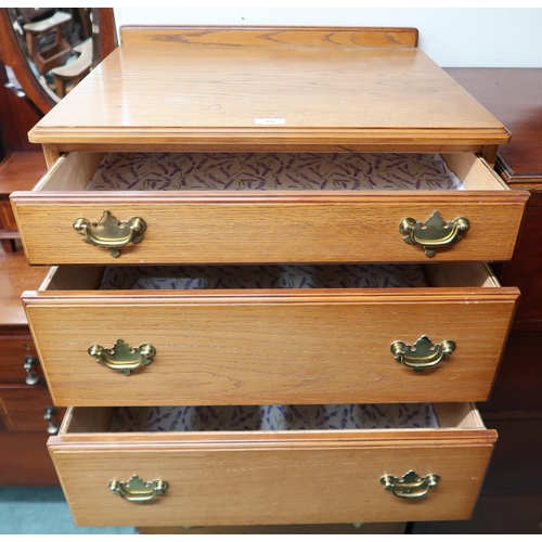 70 - A pair of 20th century oak three drawer chests, 65cm high x 62cm wide x 51cm deep