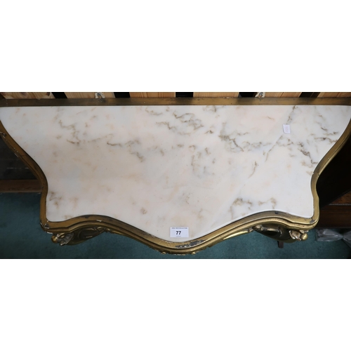 77 - A 20th century continental gilt serpentine front hall table with marble inset top over scrolled supp... 