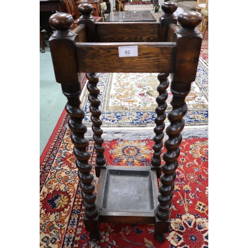 82 - A 20th century oak barley twist umbrella stand, 82cm high x 31cm wide x 31cm deep