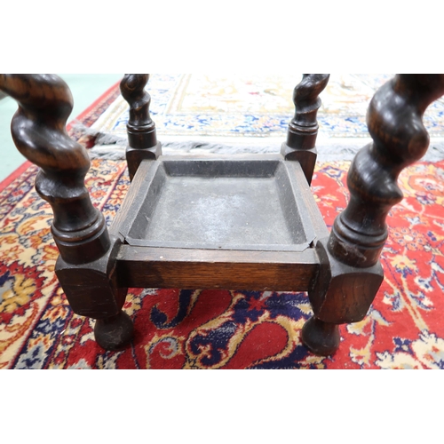 82 - A 20th century oak barley twist umbrella stand, 82cm high x 31cm wide x 31cm deep