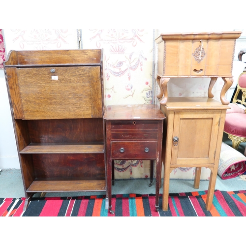 83 - A 20th century oak fall front writing bureau (def), oak bedside cabinet and mahogany sewing work tab... 