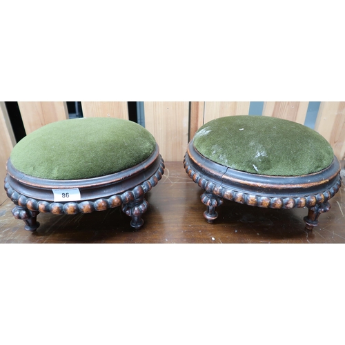 86 - A pair of Victorian walnut framed circular footstools with gadrooned edges on turned feet (2)