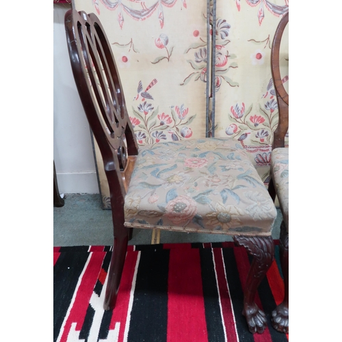 92 - A pair of 19th century walnut framed dining chairs with shaped pierced splats over tapestry upholste... 