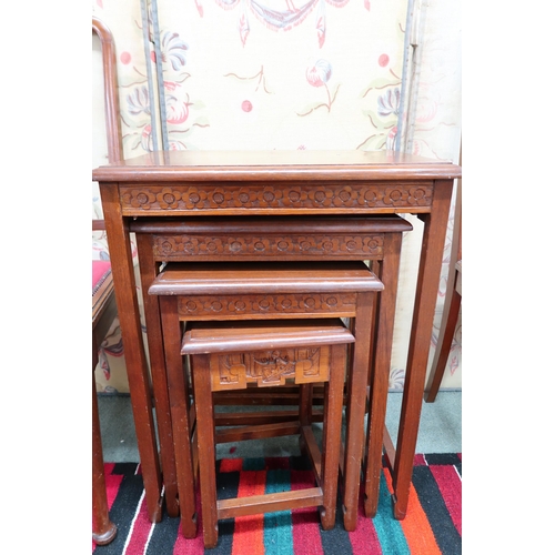 95 - A 20th century oriental style nest of four tables, a pair of bedroom chairs and an upholstered piano... 